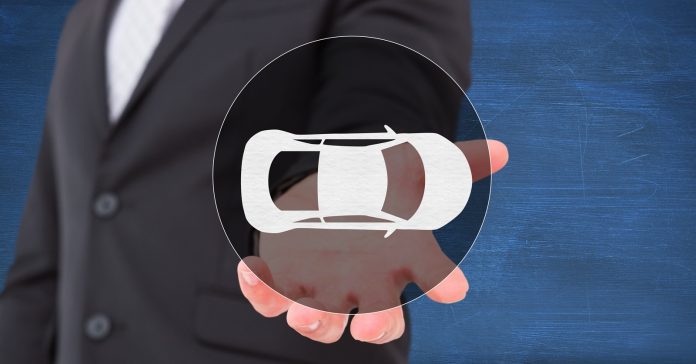 Businessman pretending to hold vector car sign