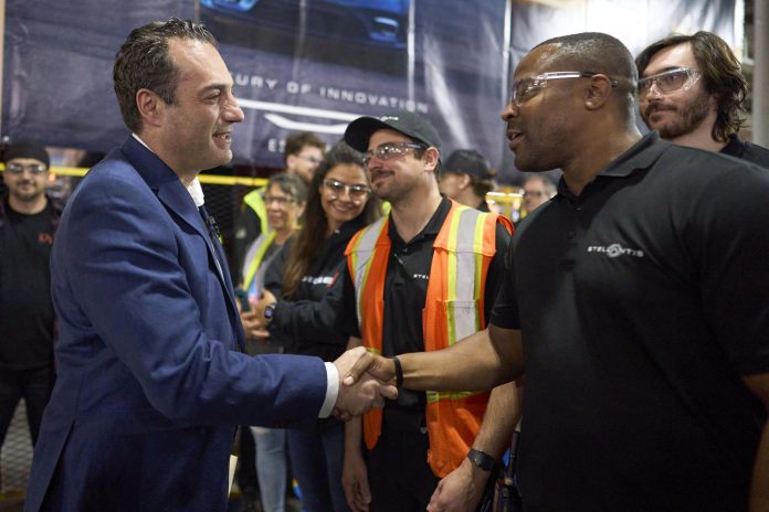 Stellantis COO of the Americas Antonio Filosa greets a Windsor A