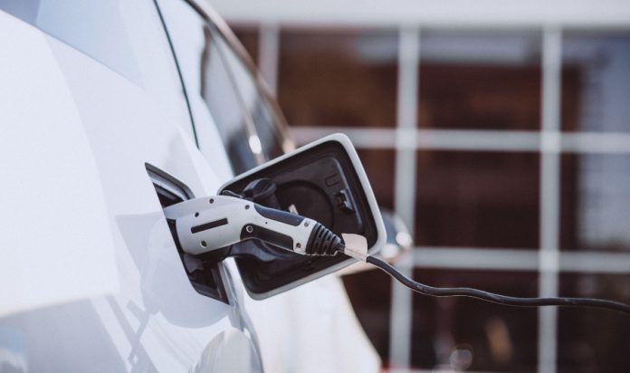 Charging electro car at the electric gas station